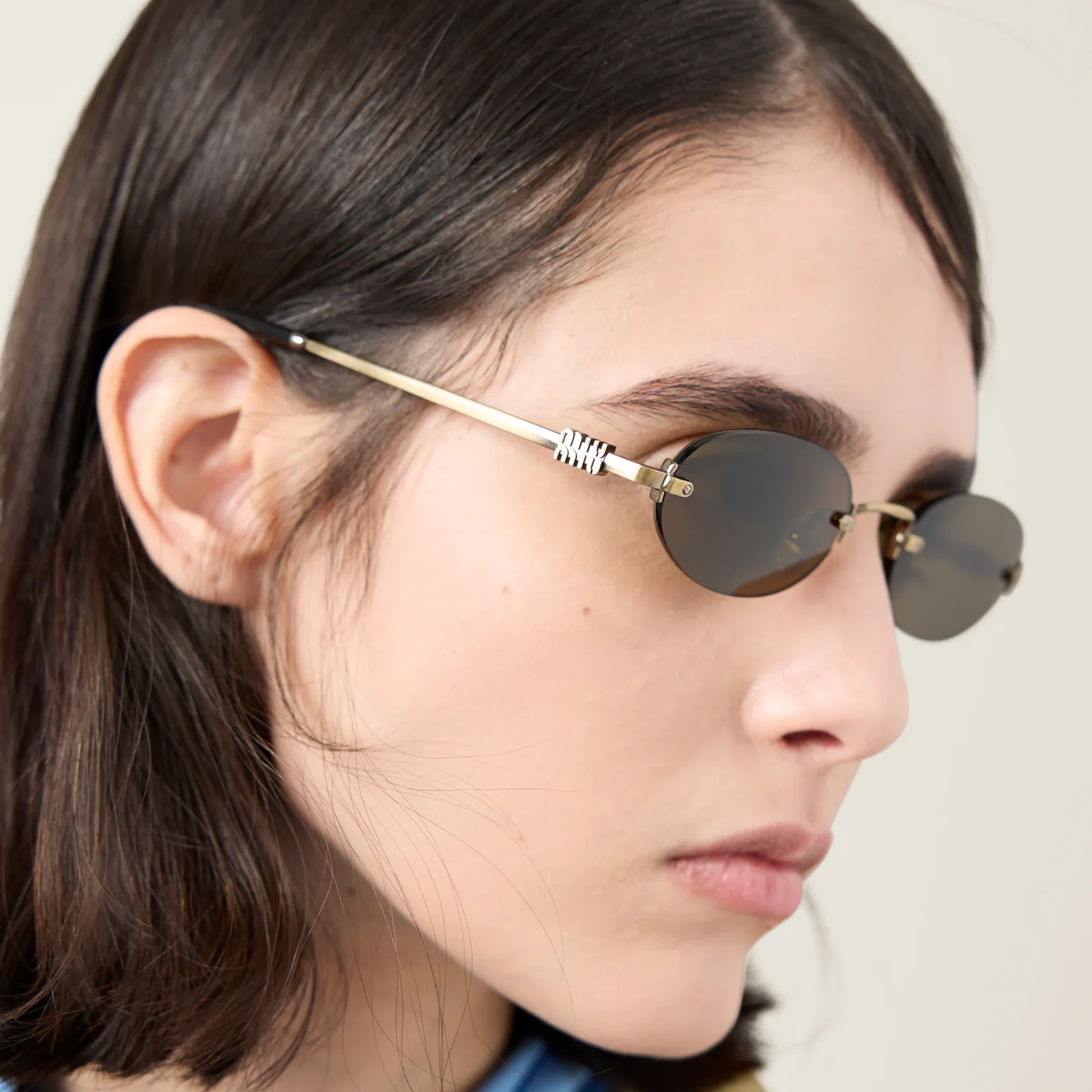 Солнцезащитные очки Miu Miu — фото 6