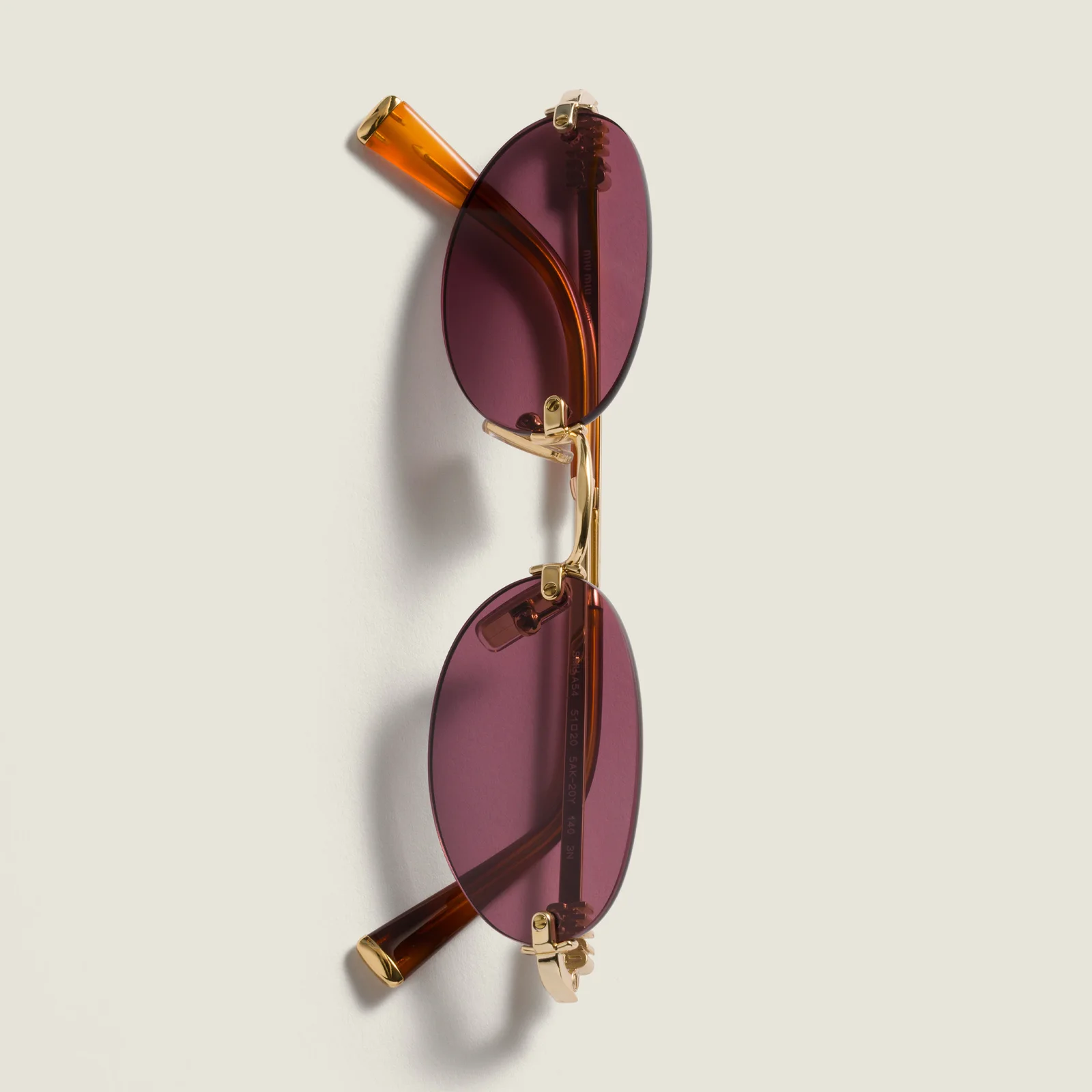 Солнцезащитные очки Miu Miu — фото 5