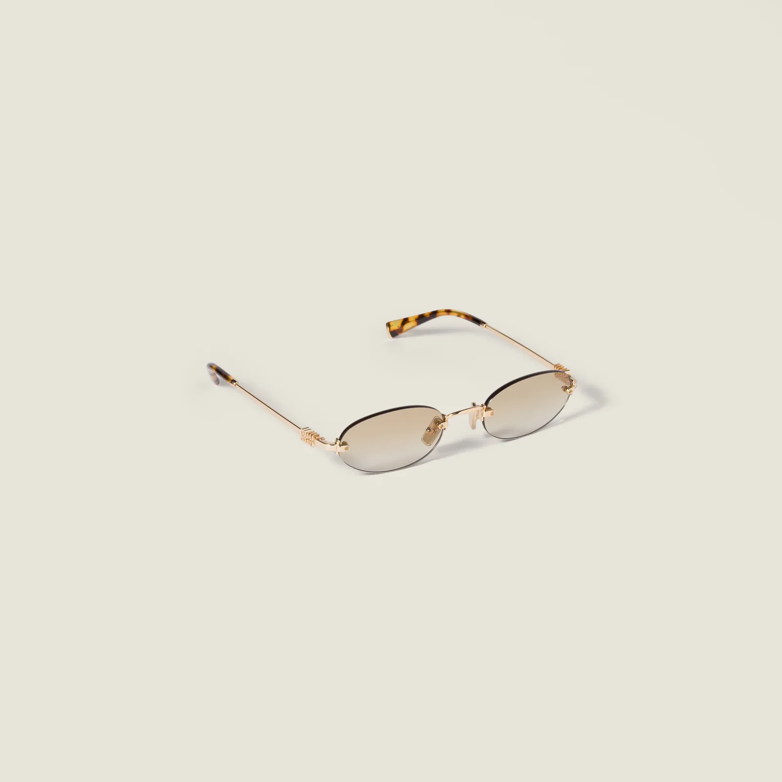 Солнцезащитные очки Miu Miu — фото 2