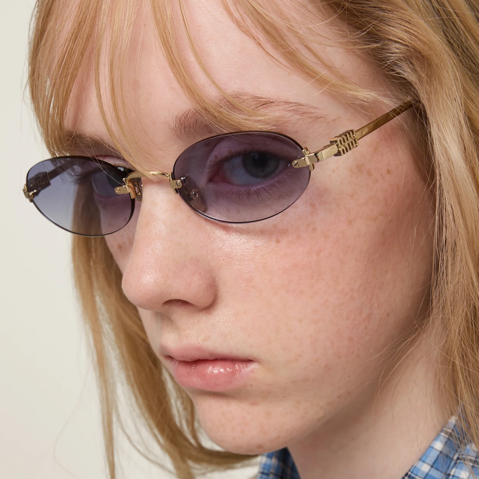 Солнцезащитные очки Miu Miu — фото 2