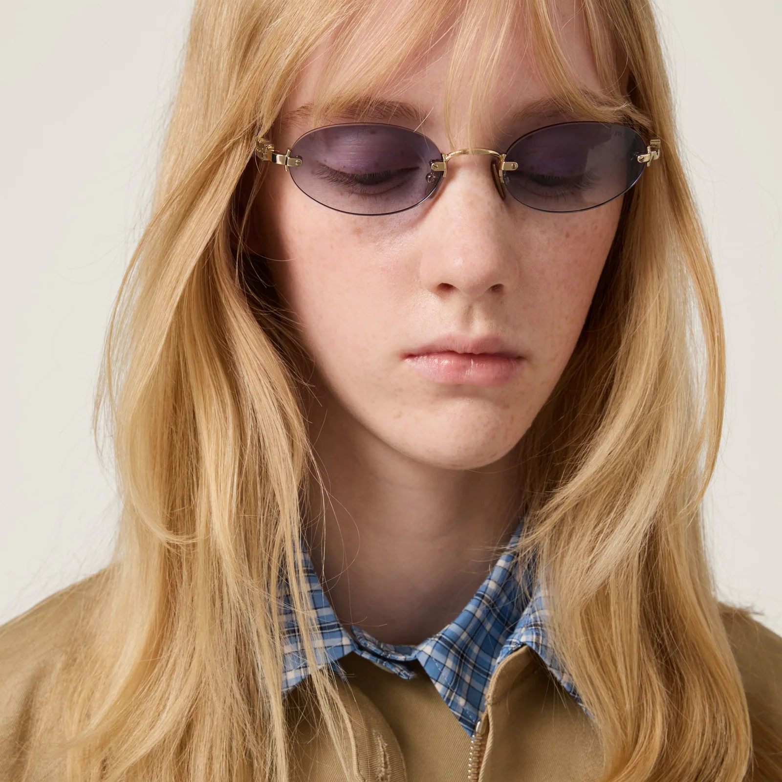 Солнцезащитные очки Miu Miu — фото 6
