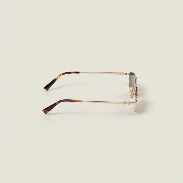 Солнцезащитные очки Miu Miu