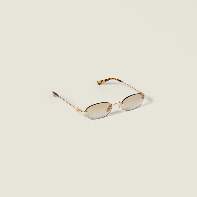 Солнцезащитные очки Miu Miu