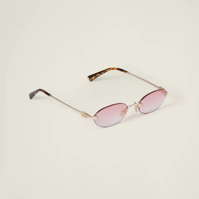 Солнцезащитные очки Miu Miu