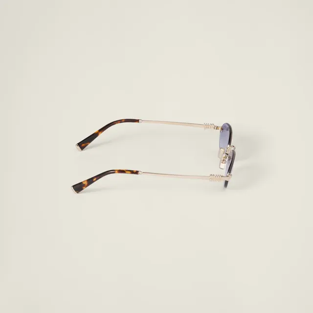 Солнцезащитные очки Miu Miu