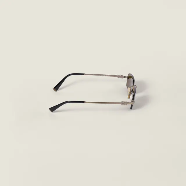 Солнцезащитные очки Miu Miu