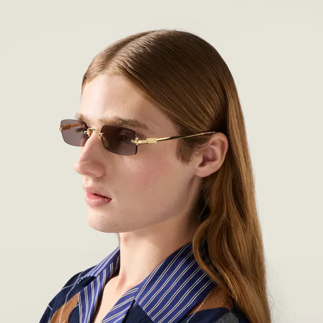 Солнцезащитные очки Miu Miu