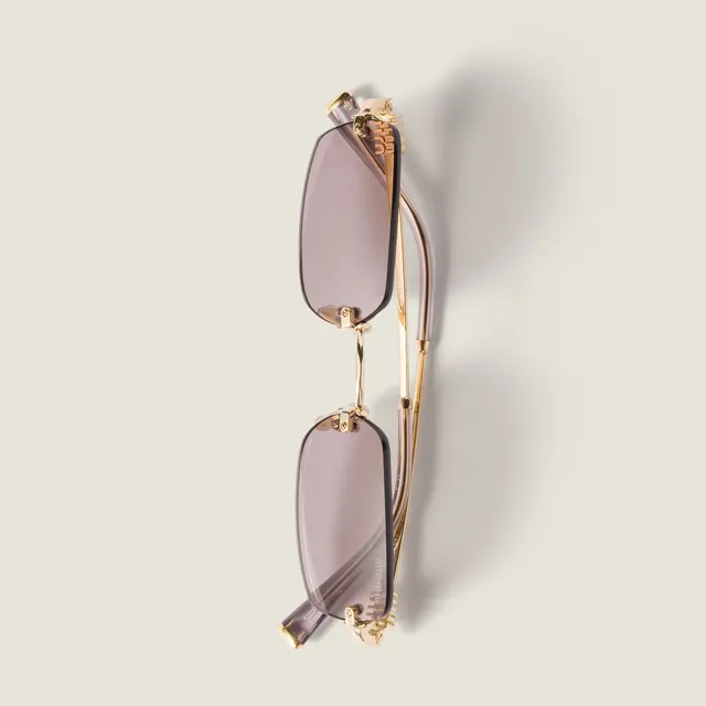 Солнцезащитные очки Miu Miu