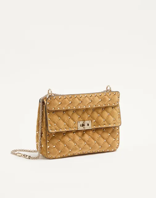 Сумка среднего размера Valentino Garavani Rockstud Spike из замши