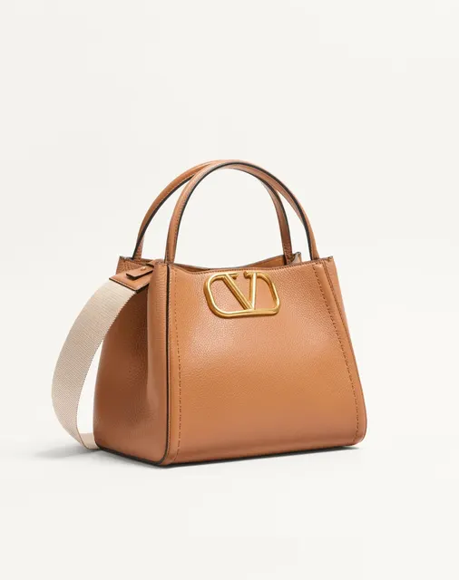 Сумка с ручками среднего размера Valentino Garavani Alltime из зернистой телячьей кожи