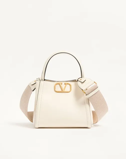 Маленькая сумка с ручками Valentino Garavani Alltime из зернистой телячьей кожи