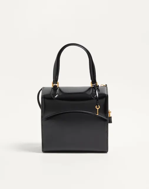 Сумка-боулинг Valentino Garavani Vain-Case из глянцевой телячьей кожи