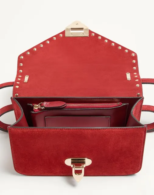 Маленькая сумка через плечо Valentino Garavani Rockstud из замши