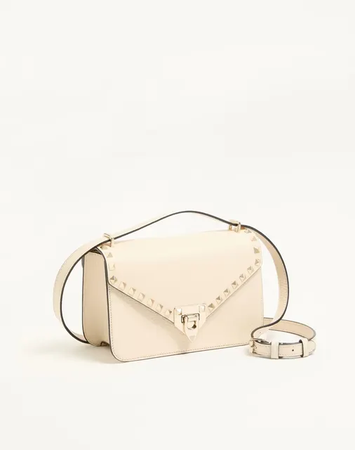 Маленькая сумка через плечо Valentino Garavani Rockstud из зернистой телячьей кожи