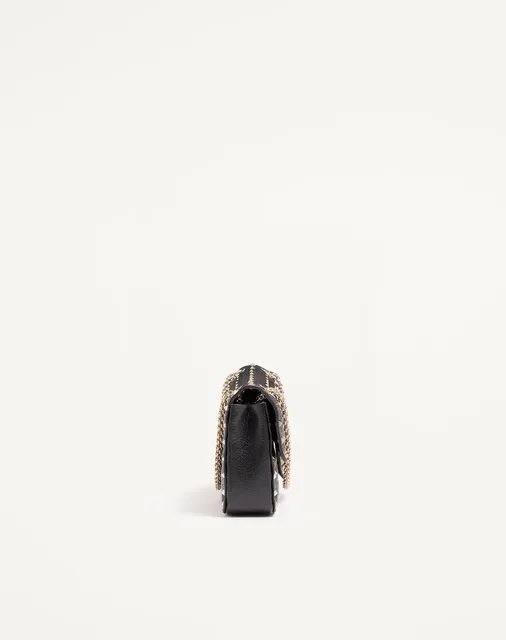 Сумка через плечо среднего размера Valentino Garavani Rockstud Spike из козьей кожи