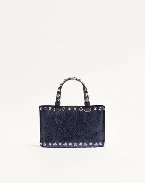 Мини-сумка-тоут Valentino Garavani Rockstud из ламинированной телячьей кожи