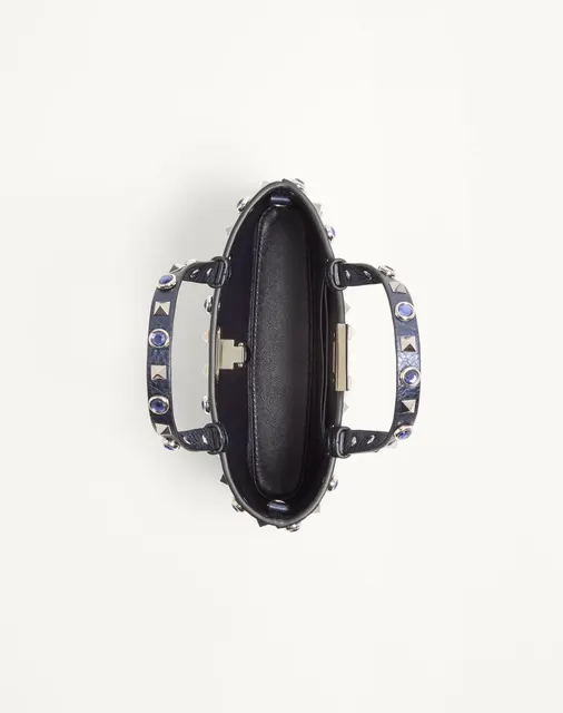 Мини-сумка-тоут Valentino Garavani Rockstud из ламинированной телячьей кожи
